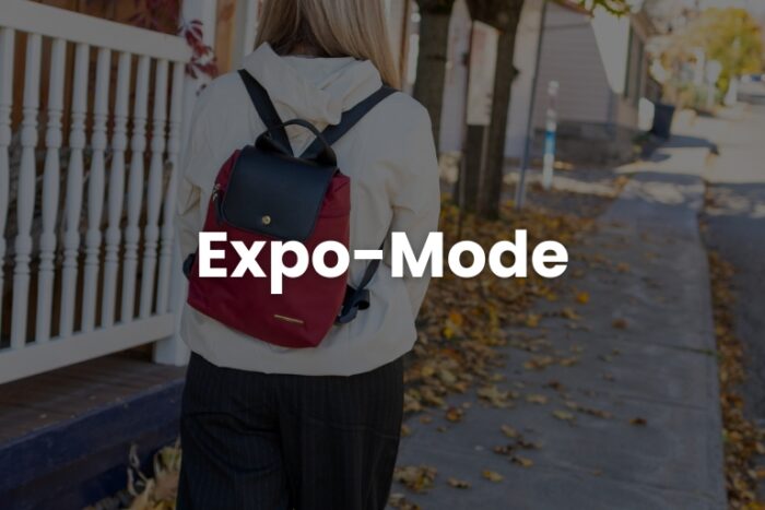 women walking outside during autumn with red urbani backpack