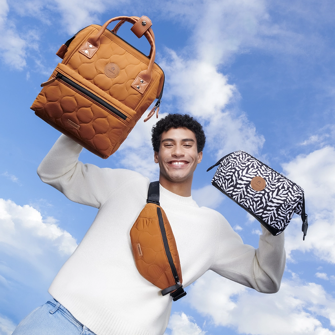 cabaiasquarewinter2025_2 men holding cabaia smiling